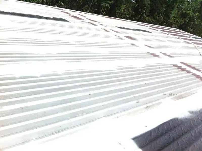 New metal roof panels installed on a home