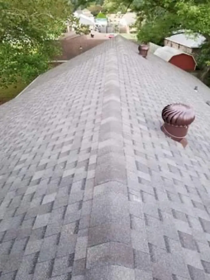 New shingle roof ridge with a turbine attic vent